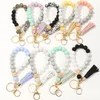 9 färger Trä Tassel Bead String Armband Keychain Matkvalitet Silikonpärlor Armband Kvinnor Tjej Keyring Armband