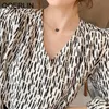 Women's Long Sleeve Tie Front Knot Casual Loose Fit Fashion V Neck Button Up Puff Cropped Top Shirt Plus Size 210601