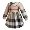 春秋の赤ちゃんの女の子長袖のドレスコットン子供の格子縞の王女のドレスターンダウンカラー子供のスカート2-7年