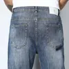 Männer Jeans zerrissene Männer blaue Stretch Capris Hosen trendige gedruckte Muster zerstört Hip Hop geschnittene Hose Baggy Harem