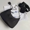 2021 Högkvalitativa väskor dam män 3 st i en väska Nylon läder clutch Axelväska Lyx Designers handväskor ShoulderBag Crossbody Handväska handväska och plånbok