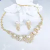 Collier de boucles d'oreilles 2021 Fashion Retro Shell Pearls avec fleur zircon Golden Ored Ored Set, mariage Bride Banquet Robe Dîner bijoux