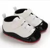 Baby First Walker Sneakers Lettre de haute qualité Classic Newborn Girls Boys Soft Sole Shoes Toddler Kids Prewalker Boot