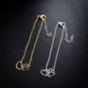 Simple Européen et American Animal Foot Paw Peach Coeur Pendentif Croissant Collier Chaîne Crieuse Grossiste