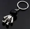 رائد الفضاء Keychain قلادة الإبداع الفضاء روبوت مفتاح سبيكة السيارة سحر رأس هدايا الذهب الأسود الفضة