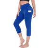 Kvinnor sträcker sig 3/4 yogabyxor leggings fitness som kör gym sportfickor Aktiv kalvlängd byxor capri byxa hög midja leggins H1221