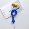 Women use cartoon phone lanyards popular roses to protect mobile phones against losing ropes and soft silicone lanyard