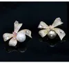 Broches élégantes en cristal rose bowknot pour femmes broche accesorios mujer simulé perle broche broches bijoux petite amie cadeaux