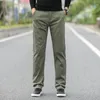メンズパンツ2022ハイストレッチスプリング秋綿ファッションビジネススーツディープブルーブラックアーミーグリーン