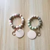 Commerce extérieur perles de silicone de qualité alimentaire poignet porte-clés disque vierge pendentif porte-clés femme multicolore en option