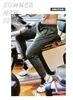 Green Fino Workout Sweatpants se encaixam rápidos secos confortáveis ​​corredores homens executando calças longas ginásio esportes fitness calças zip bolso