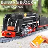 The QJ Steam Locomotive Modello Building Blocks Stampo King 12003 Motorized Train Train Assemblea High Tech Brick Educazione Bambini Regali di Natale Giocattoli di compleanno per bambini