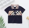 Cute Baby Boys Girls Plaid T-shirts Summer Kids Short Sleeve Tshirt Turn-Down Collar Children Cotton Shirt Child Tops Tees 1-7 Years