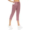 Sports Loisirs Capris Leggings Femmes Yoga Outfits de Yoga Couleur Solide Couleur Rouler Fitness Respirant Respirant Taille haute Taille à lacets élastiques Pants de yoga élastiques