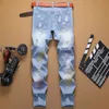 Весна мужские разорванные байкер джинсы мода тонкий отверстие паста краска модные брюки мужчина ковбои случайные прямые проблемные брюки