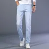 Höstens löst raka stretch jeans mode casual klassisk stil bomull denim himmel blå byxor manlig varumärke byxor 210723