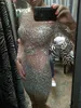 2018 Kim Kardashian Dresses Nude Crystals Cocktail Dress with Longeerves Sheer Neck Bling Shampagne Rhinestonesシースプロム9522860