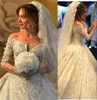 Abiti da sposa di lusso 2016 Off spalla scollo a V pieno pizzo applique in rilievo Sheer manica lunga abiti da sposa su misura una linea abiti da sposa