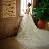 Stunning Tulles Ball Gown Sheer Wedding Dresses Sleeveless High Collar Backless Lace Cathedral Train Tiers Formal Bridal Gowns