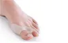 KOSTENLOSER VERSAND 2 Paar = 4 Stück Gel-Bunion-Zehenspreizer, lindert Fußschmerzen, Fuß-Hallux-Valgus-Schutzkissen, Zehenspreizer des Fußpflegewerkzeugs