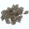 Caldo ! 200 pendenti con ciondoli a forma di foglie in filigrana in lega di bronzo antico, 10,5 x 19 mm, gioielli fai da te