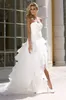 Högt lågt bröllopsklänningar 2015 Ny ankomst Vintage Organza A-Line Bridal Gowns Stropless White Beach Bröllopsklänningar med handgjord blomma