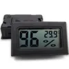 Atacado-Mini Digital LCD Indoor medidor de umidade de temperatura termômetro higrômetro calibre