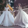 2018 Nya rygglösa sjöjungfru spets bröllopsklänningar med löstagbara tåg långa ärmar pärlstav tyll overskirt dubai arabiska brudklänningar