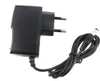 Högkvalitativ AC DC 12V 1A 9V 1A 5V 1A Strömadapter Tillförsel 5V 2A Adapter US / EU-kontakt med IC Version CE-certifiering 100PCs Gratis frakt