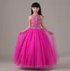 Belle Princesse Fuchsia Jewel Décolleté Longue Robes De Fille De Fleur Perles Tulle Étage Longueur Robe De Bal Dos Nu Robe De Fête De Mariage Fille