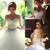 Sheer Tulle Ball Gown Bröllopsklänningar 2020 Med Illusion Långärmad Crew Neck Lace Up Back Sequins Beaded Pearl Pretty Bridal Gowns Bo7695