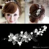 Nowy Tanie Hot Spring Bridal Tiaras Korony W Magiczce Opaski Wesele Akcesoria do włosów Faux Pearl Flower Błyszczący Kryształ Tiara Biżuteria Bridal