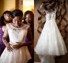 Sheer Neck Beaded 2015 Bröllopsklänningar Beading Plus Storlek A-Line Tulle med Lace Appliques Bröllopsklänningar Sparkle Kristaller Arabiska Brudklänningar