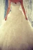 2015 Spring Beaded Crystals Wedding Dresses Flouncing Ruffles Handmade Flower Organza Wedding Gowns Sweetheart Ball Gown Elegant Bridal Gown