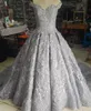 Costoso 2017 Abiti da sposa in cristallo di lusso Sexy Bling con perline in pizzo Ricamo con spalle scoperte Una linea Abito da sposa senza schienale Cappella treno EN7104