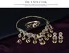 Mode autriche cristal goutte d'eau émeraude/rubis noir gemme collier ensembles de bijoux Design classique 18K plaqué or femmes cadeau de fête
