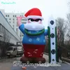 Wonderful Giant Surfing Inflatable Santa Claus Model Advertising Airblown Santa Balloon Holding A Surfboard for Outdoor Christmas Decoration