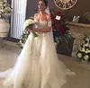 2016 Lace Bridal Gowns with Detachable Tulle Overskirt and detachable Short Sleeves Beaded Ivory Over Nude Color Wedding Dresses