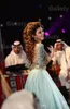 Sexy menthe verte arabe robes de bal sans dos et cristaux de taille en strass myriam tarifs robes formelles de concours