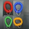 Gratis frakt Färgrik Coil Key Ring Plastic Spiral Spole Armband Band Keychain