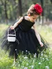 Elegante mooie baljurk thee-lengte bloem meisje jurk satijn en tule mouwloze jurken