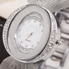 Femmes robes montres quartz montre le bracelet en mailles de luxe montre le bracelet d'or oval en alliage en alliage