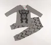 Ins Baby Boy Little Monster Cartoon Cartoon Abiti da due pezzi Set manica lunga / manica corta Tshirt stampata Tshirt + Pantalone lungo Abbigliamento per bambini Abbigliamento Monster Pigiam E92