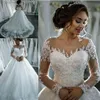 2018 Tanie Suknie ślubne Vestido Jewel Neck Illusion Lace Aplikacje Zroszony Długie Rękawy Linii Court Train Formalne Plus Size Suknie Ślubne