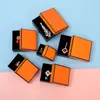 Orange Märke Presentförpackning Boxar för halsband Örhängen Ringpapper Kort Retail Packing Box för mode smycken tillbehör