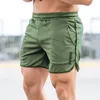 2021 Men Running Shorts Sports Gym Compression Phone Pocket Wear Under Base Layer Short Pants Athletic Solid Tights248f