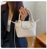 Beliebte kleine Tasche der Mädchen dieser Frauen Sommer neue Mode Canvas Messenger Bag Pu Spleißen Nylon Handtasche Räumungsverkauf