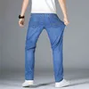 Shan Bao Straight Loose Lightweight Stretch Jeans sommar klassisk stil Business Casual Young Men's Thin Denim 211108