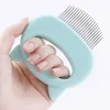 Giocattoli per gatti 1 pezzo Pettini per massaggi per cani da compagnia tenuti in mano Grooming ABS Soft Brush Care Pettine per la depilazione Forniture per la pulizia degli animali