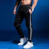 Pantalones de jogging para hombres GYM Ropa deportiva Pantalones deportivos Pantalones deportivos para correr para hombres Pantalones deportivos para correr con bolsillos 4